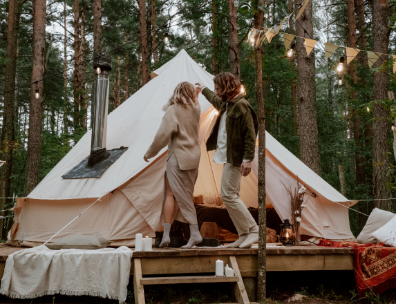 Couple Tent Camping On Hills